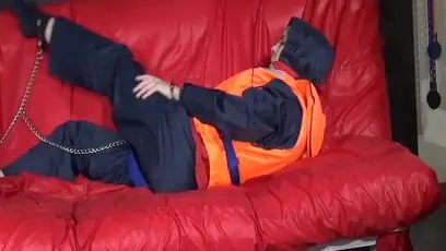 Get 3 archive videos with nice young women enjoying bondage in shiny nylon rainwear from 2008
