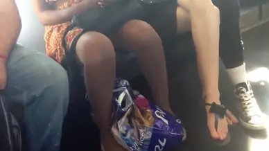 Candid crossed legs and thong sandal feet