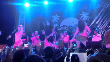 Hot festival with a lot of babes walking around topless in