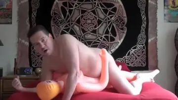 Cumming in blonde blowup sex doll