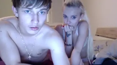 A slim blonde with nice tits gets teased on cam