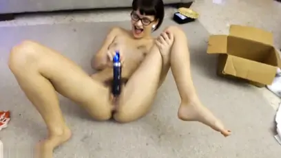 Sexy girl is licking a dildo