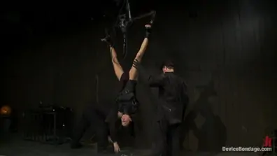 Bound in a straightjacket inverted suspendedfucked by a machine made to suck cock and zippered