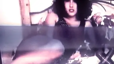 Latina fucks a bottle