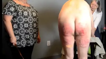 Severe caning held down