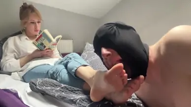 He sniffs and licks my sweaty boots socks and feet
