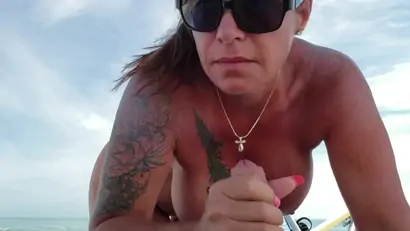 Big titty wife sucks my cock on the beach and takes a load