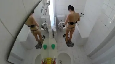 Beautiful housewife removes her clothes in order to wash her juicy holes