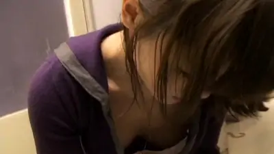 Asian candid down blouse video with brunette babe