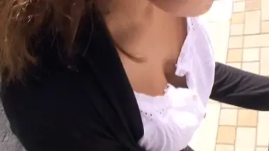 Cute asian participates in downblouse action