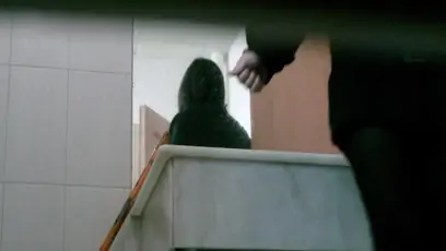 Toilet camera video shows a gorgeous asian chick preparing to piss