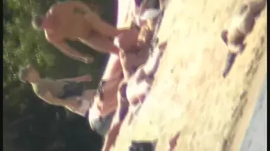 Tempting bodies in sexy swim suits on the public beach