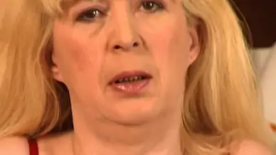Blond granny bonks herself on the kitchen floor