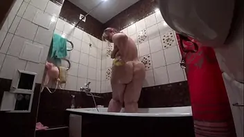 Granny with a fat ass rides cock in kitchen